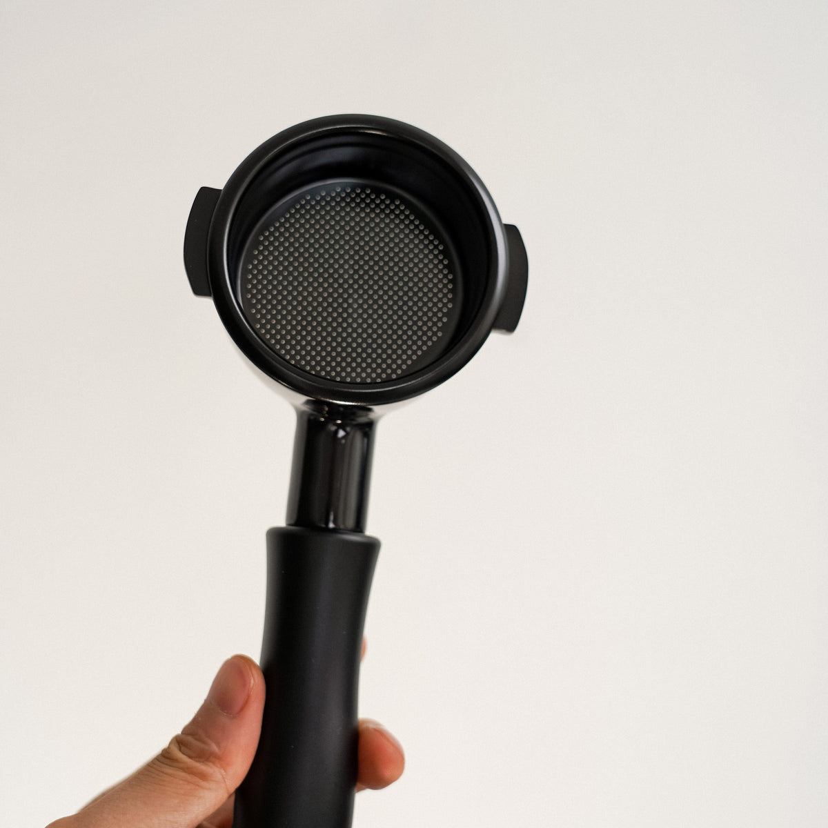 Normcore Bottemless Portafilter mit Titanium PVD Beschichtung E61 - Coffee Coaching Club