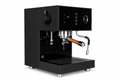 Arkel Tide dual boiler espresso machine in black with touchscreen, pressure gauge and wooden steam wand handle