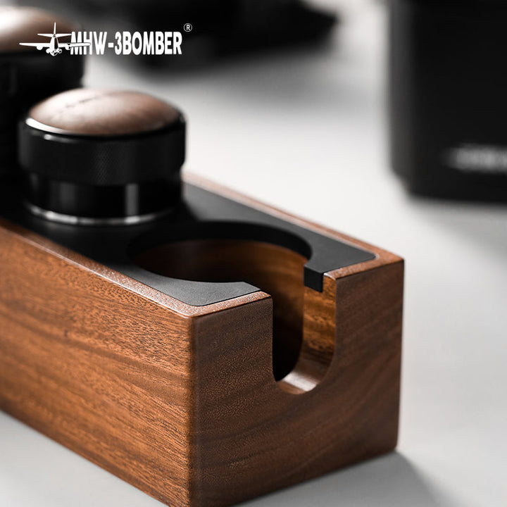 MHW-3BOMBER multifunctional portafilter holder tamping station in walnut with black (Walnut/Black) with cut-out for the portafilter handle, close-up