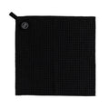 Flate Magnetic Barista Towel en negro, foto de producto con textura de gofre y lazo para colgar
