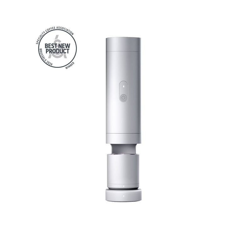 Varia ORBI PRO, máquina de espresso en plata (Silver) en el Home Dock con báscula de taza
