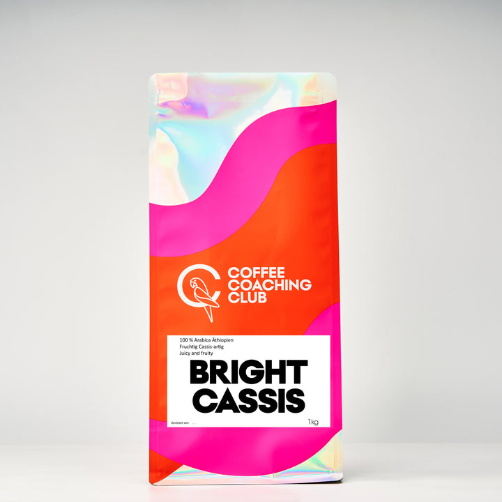 Caffè in grani Bright Cassis 1 kg – omniroast chiaro, 100 % Arabica da Guji, Etiopia, fruttato con nota di cassis – sacchetto Coffee Coaching Club