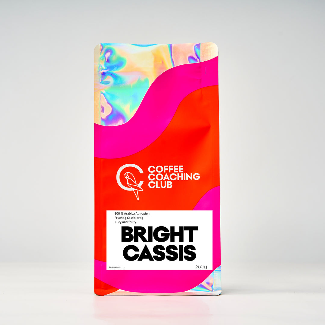 Caffè in grani Bright Cassis 250 g – omniroast chiaro, 100 % Arabica da Guji, Etiopia, fruttato con nota di cassis – sacchetto Coffee Coaching Club