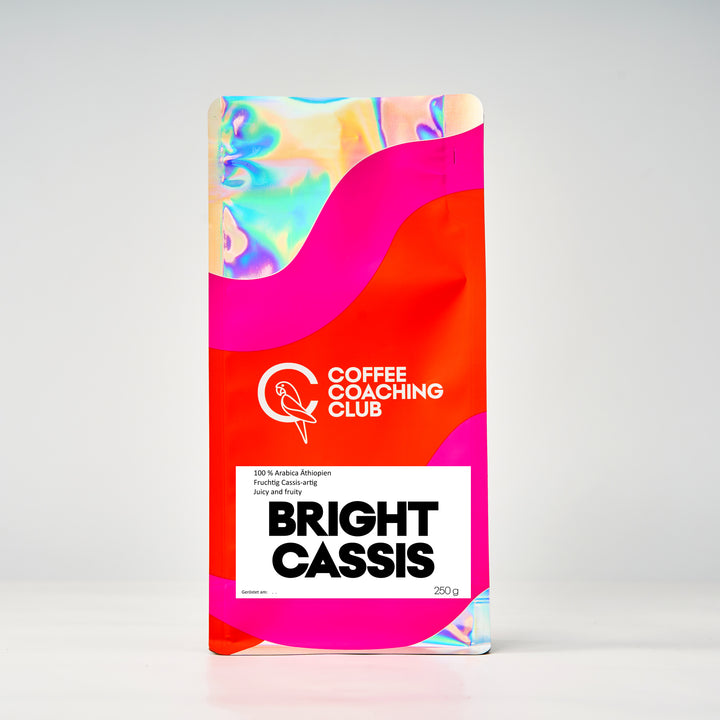 Caffè in grani Bright Cassis 250 g – omniroast chiaro, 100 % Arabica da Guji, Etiopia, fruttato con nota di cassis – sacchetto Coffee Coaching Club