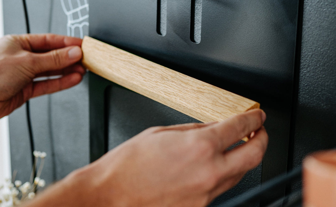 Flate Barista Station Mini oak magnetic strip being attached by hand – Coffee Coaching Club 7