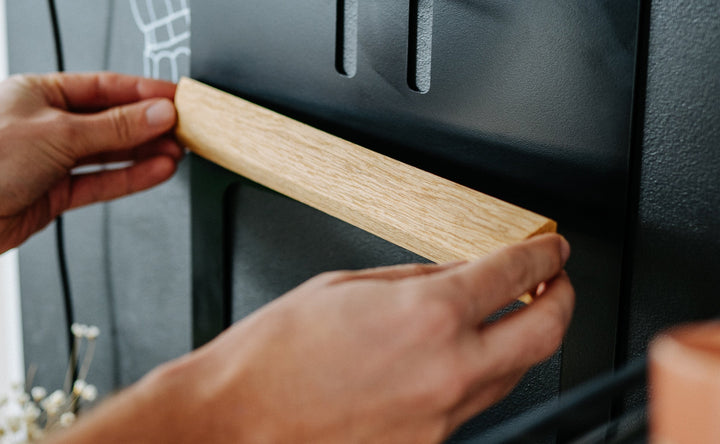Flate Barista Station Mini oak magnetic strip being attached by hand – Coffee Coaching Club 7
