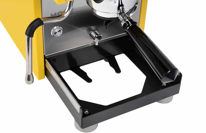 Profitec MOVE 2.0 in yellow with open drip tray and holder for the blind basket