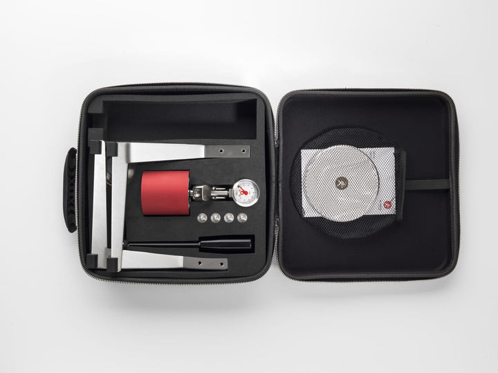 Olympia Express Mina in red inside the open travel case