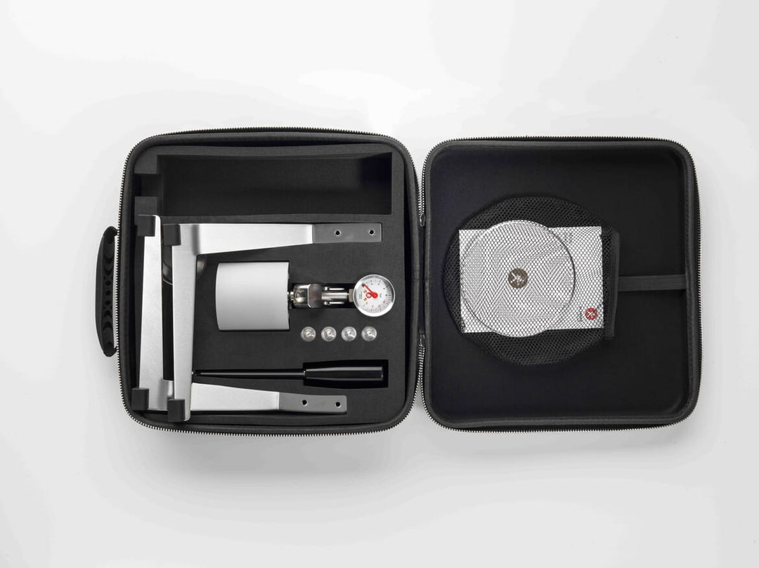 Olympia Express Mina in silver inside the open travel case