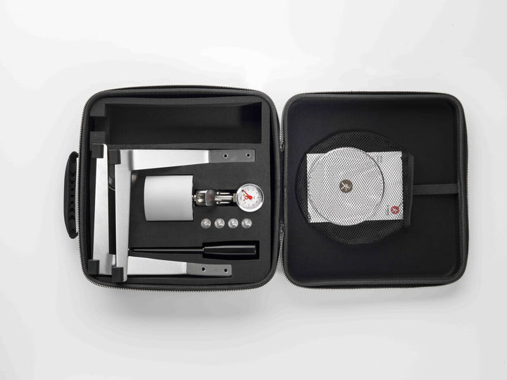 Olympia Express Mina in silver inside the open travel case