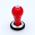 Olympia Express Tamper 54mm vermelho com logótipo Maximatic – Coffee Coaching Club 1