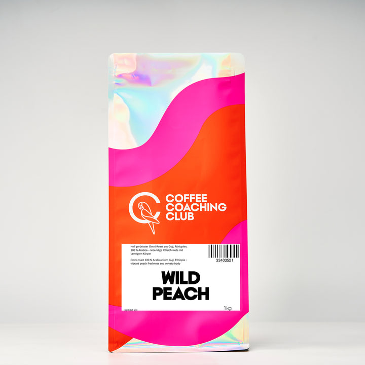 Wild Peach coffee beans 1 kg – light-roasted omniroast, 100% Arabica from Guji, Ethiopia, with a peach note – bag by Coffee Coaching Club